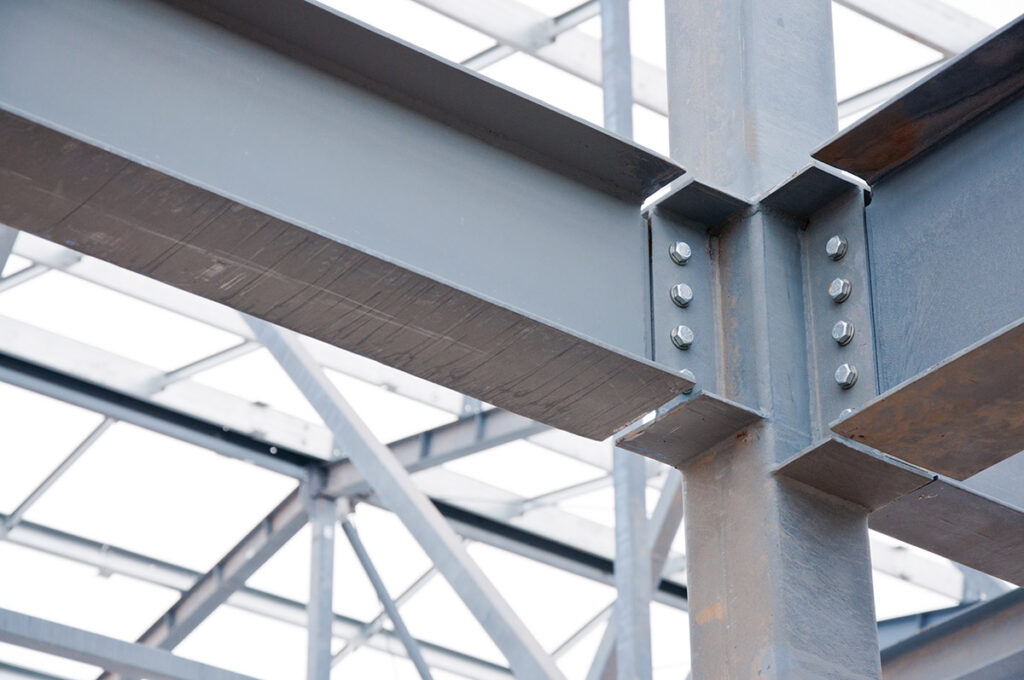 Metal frame of the new building against the sky